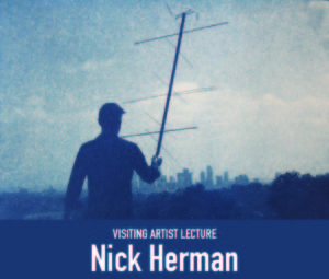 Photo of a man in silhouette holding an antennae